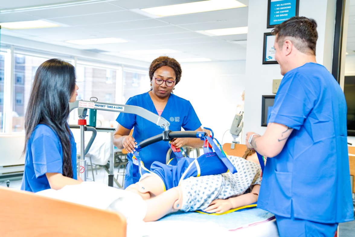 Nurses using a patient lift